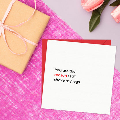 Anniversary Card for Him – You Are the Reason I Still Shave My Legs – Husband Valentines Day Card, Eco-Friendly 150x150mm, Funny Valentines Card Boyfriend, Fiancé – Premium 350 GSM – Made in the UK