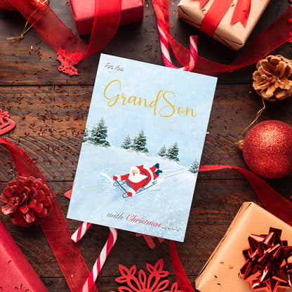 Grandson Christmas Card for Boys – Fun Sledging & Snowman Xmas Design – 22 x 15.5 cm – Eco-Friendly Christmas Card Grandson – Inside Message – Made in the UK